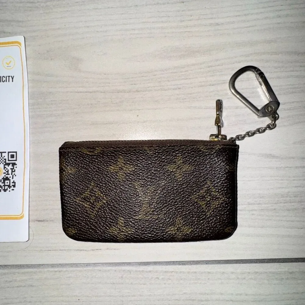 Louis Vuitton Monogram coin purse keychain  with an Entrupy Certificate of Authe